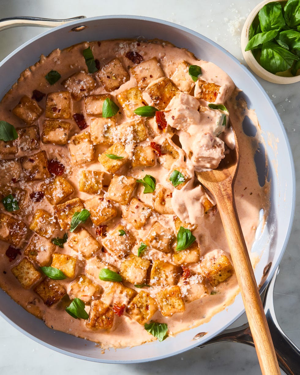 cubes of tofu in a creamy marry me sauce