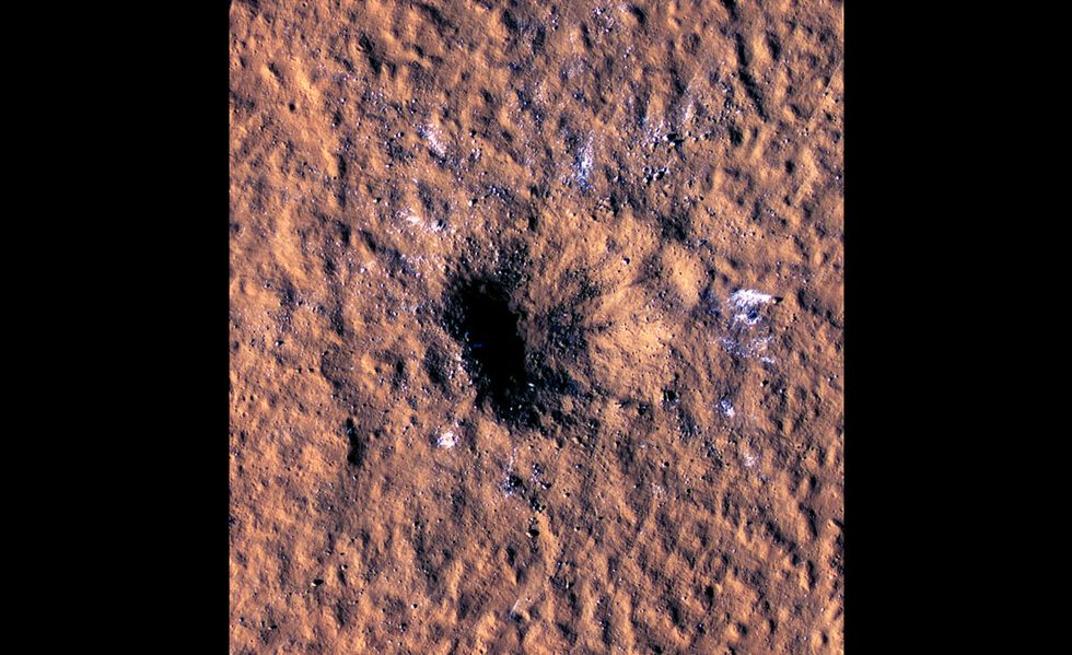 mars crater shows water ice along its borders