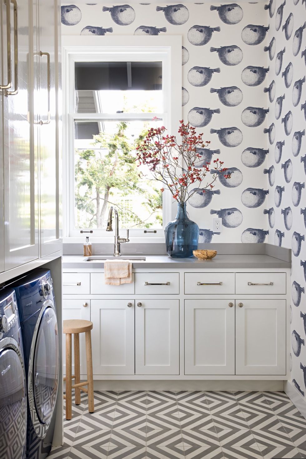 a laundry room with wallpaper