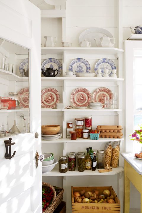 a kick back kind of cottage martha’s vineyard retreat homeowners phoebe cole smith and mike smith open storage, dishware, pantry
