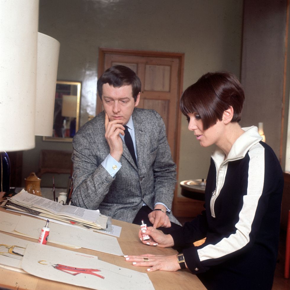 circa 1965  dress designer mary quant at her desk with her husband alexander plunkett greene at their home  photo by keystonegetty images
