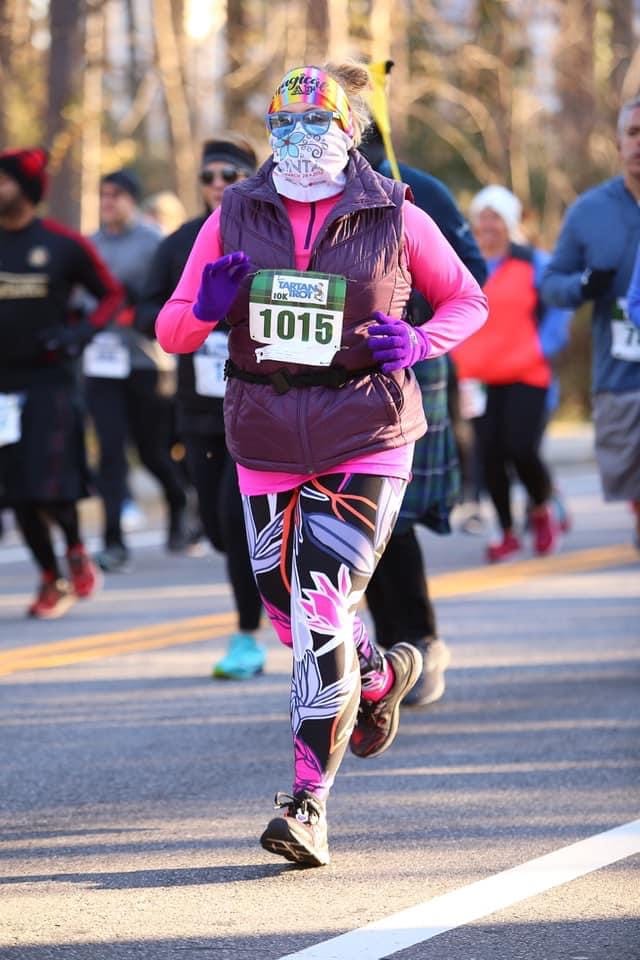 jennifer mashburn runs the tartan trot 10k in dunwoody, georgia on february 22, 2020