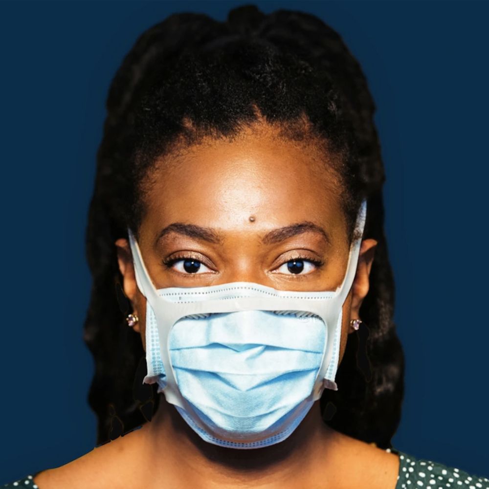 Premium Photo  A woman wearing a medical face mask to avoid the