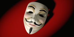 mask of guy fawkes on red