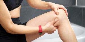 massaging pain in knee after exercise