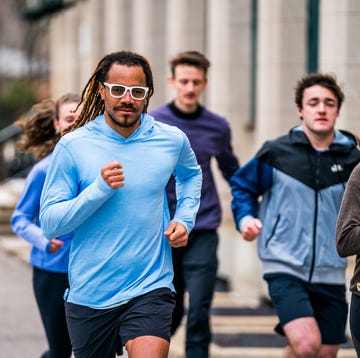 how to master the 5k group of individuals jogging together outdoors