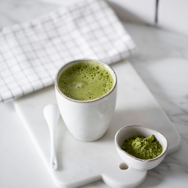 matcha green tea latte in a rustic cup