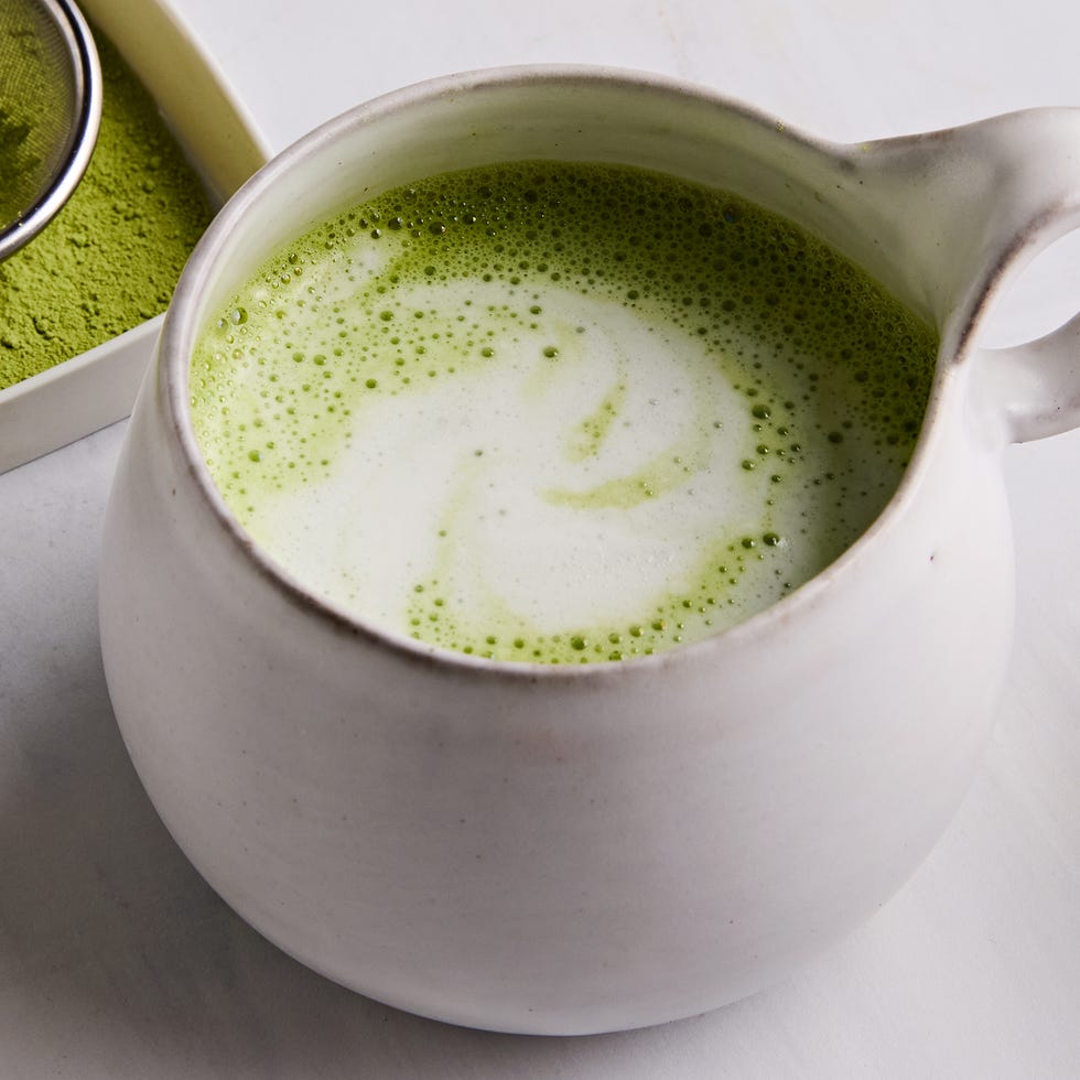 matcha latte in a ceramic white mug