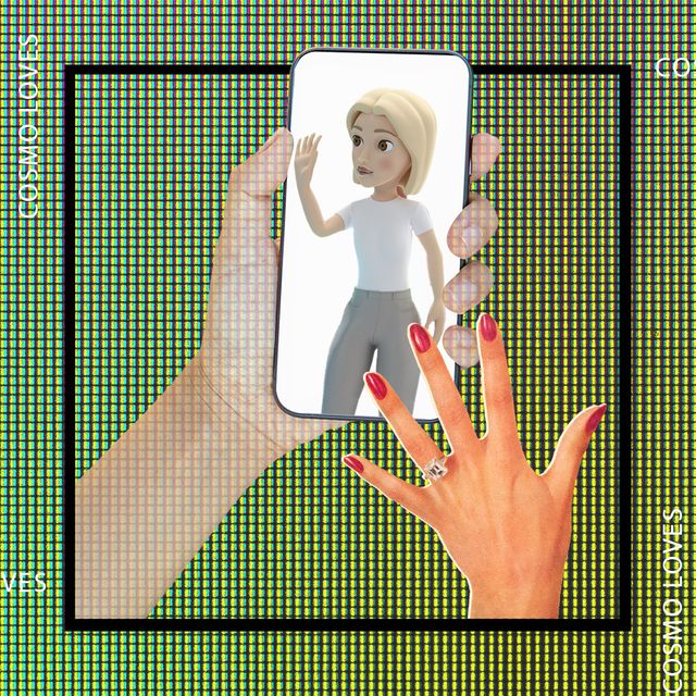 a hand holding a picture of a person
