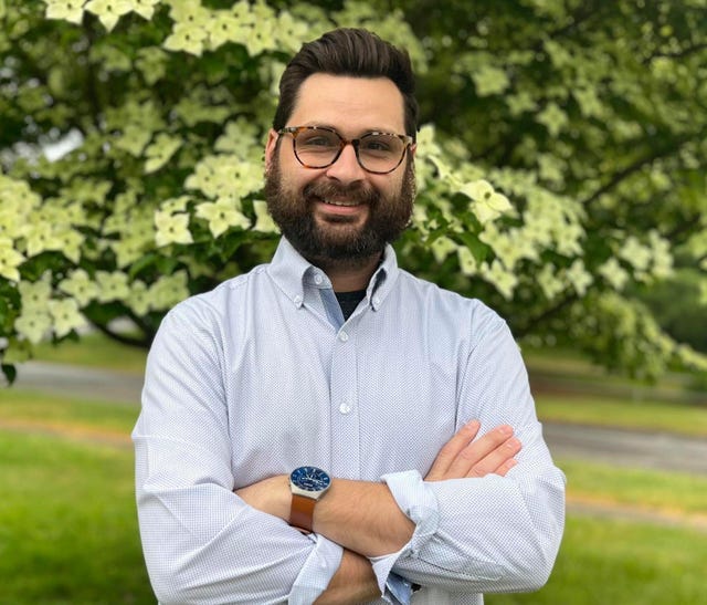 speaker matt castle's headshot, pictured outside