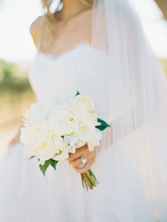 White, Photograph, Bride, Wedding dress, Bouquet, Dress, Flower, Yellow, Bridal clothing, Pink, 