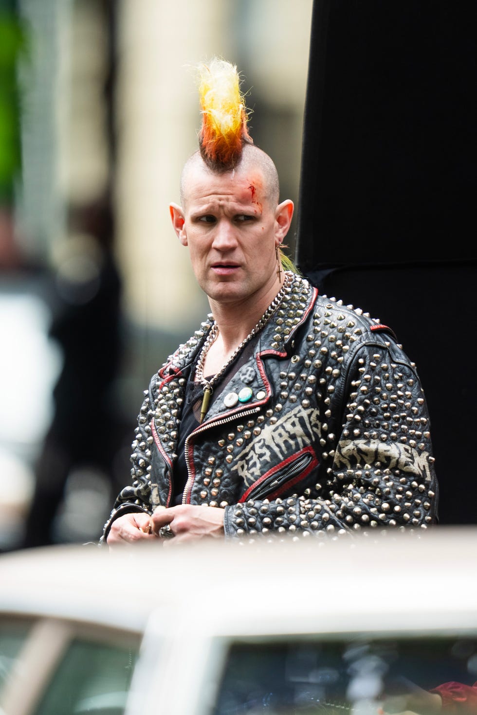 Matt Smith with a brightly colored mohawk, filming caught shoplifting, New York