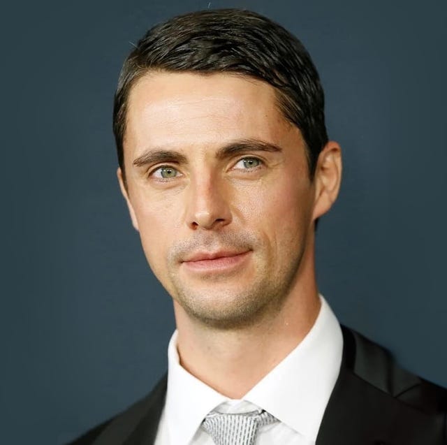 Department Q Matthew Goode formal portrait of a person in a suit and tie