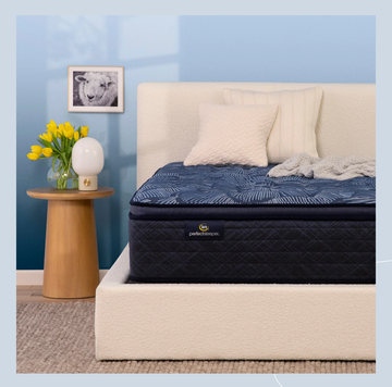 a bed with a black headboard