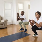 mature adult couple doing exercise at home, move run workout indoors