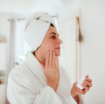 woman moisturising skincare routine