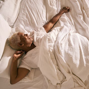 Mature woman in bed (morning) mature woman in bed morning