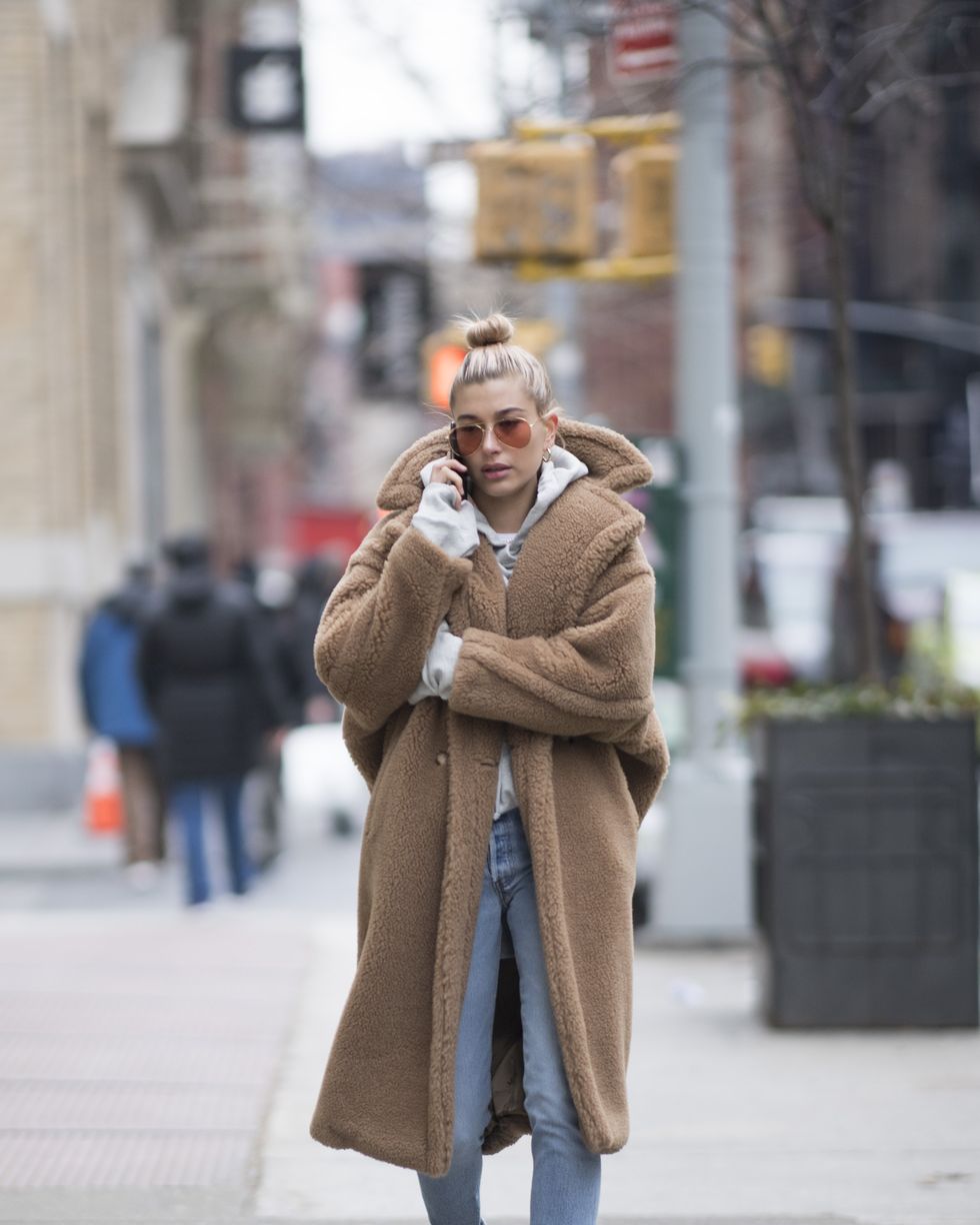 new york, ny january 16 exclusive coverage hailey baldwin seen in the streets of manhattan wearing a beige oversized coat and slippers on january 16, 2018 in new york city photo by timur emekgc images