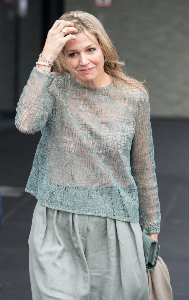 Clothing, Fashion, Fashion model, Beauty, Blond, Yellow, Outerwear, Street fashion, Dress, Fashion design, 