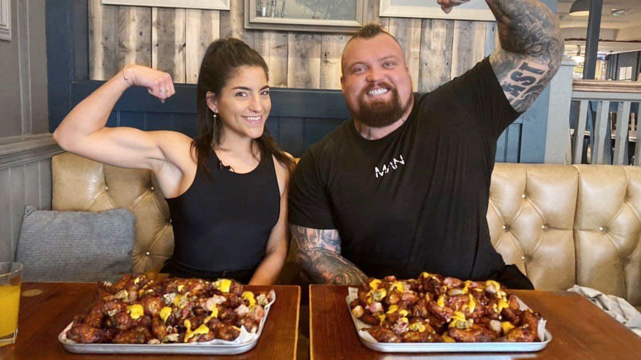 Watch This Woman Crush Eddie Hall in a Wing Eating Contest