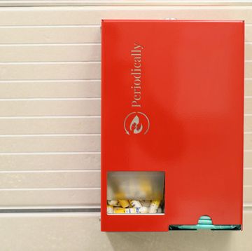 tampon and sanitary napkin dispenser from periodically