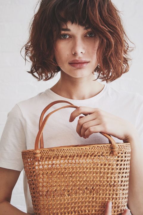 Hair, Shoulder, Hairstyle, Beauty, Wicker, Skin, Brown hair, Fashion, Joint, Neck, 