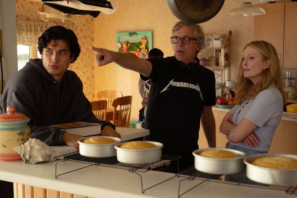 charles melton as joe, director todd haynes, and julianne moore as gracie atherton yoo on the set of may december