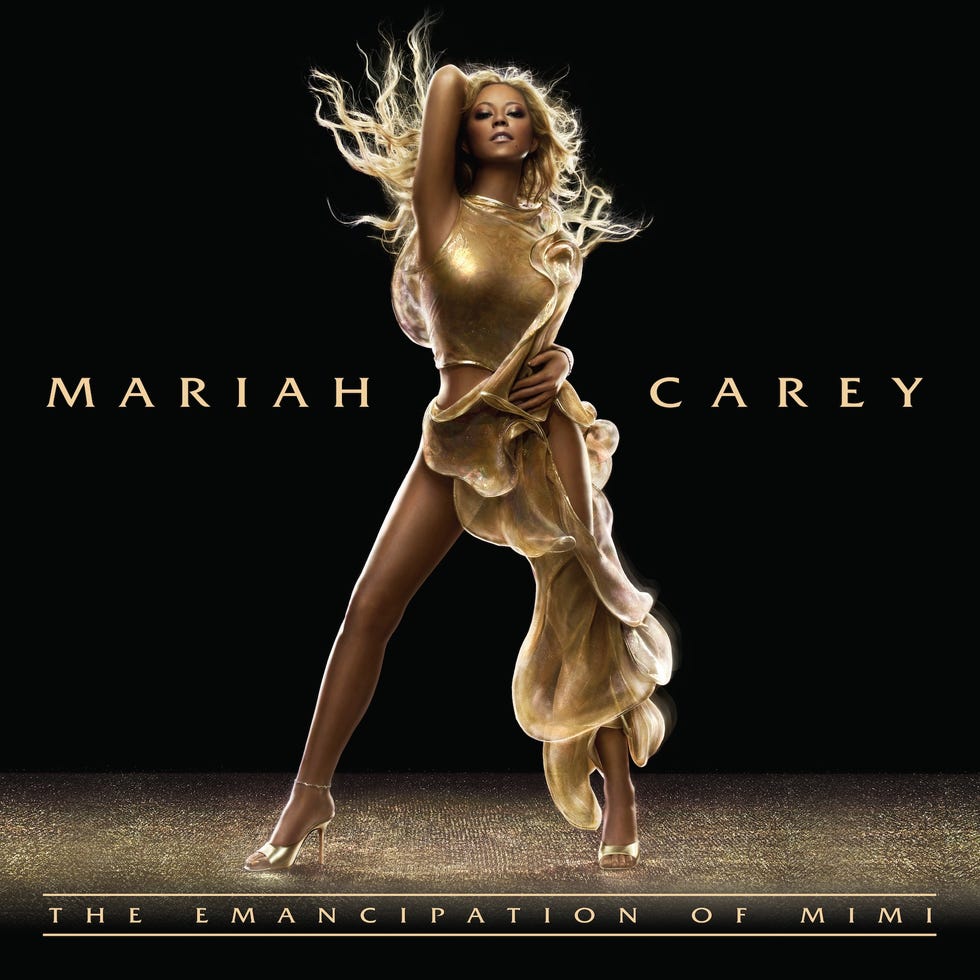 album cover featuring mariah carey in an elegant pose