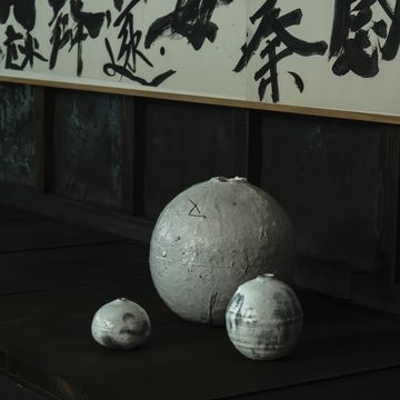 a group of white balls on a wooden surface