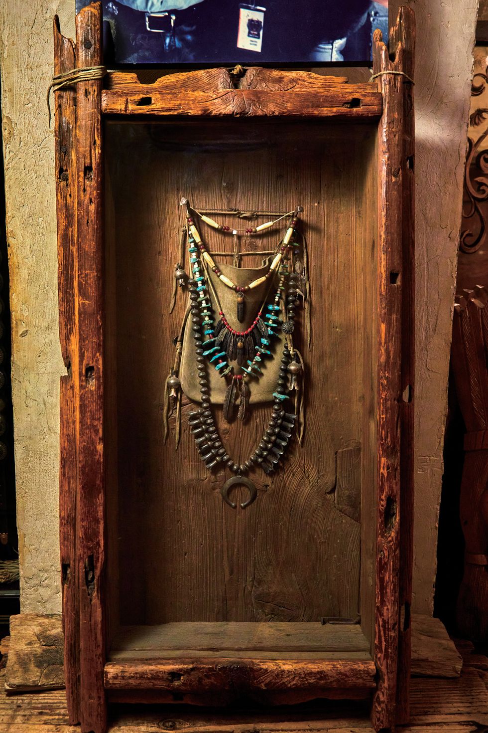 a door with a couple of necklaces from it