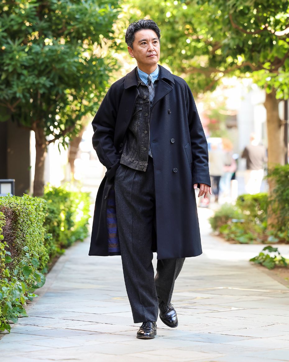 a man in a suit walking
