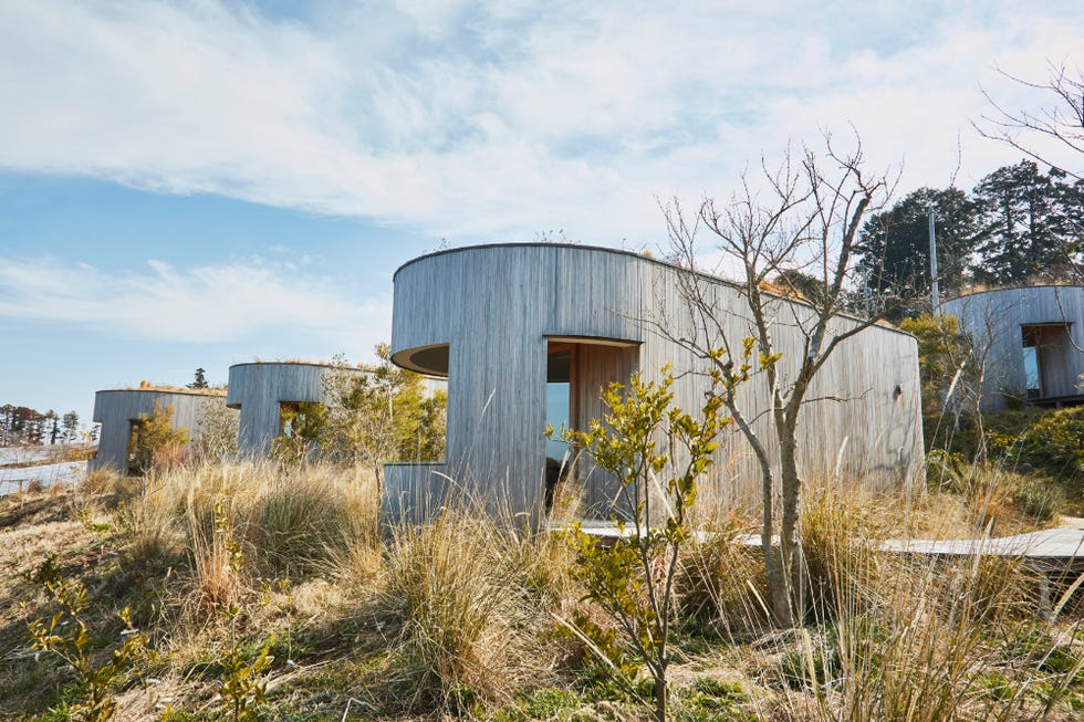 a group of buildings in a field