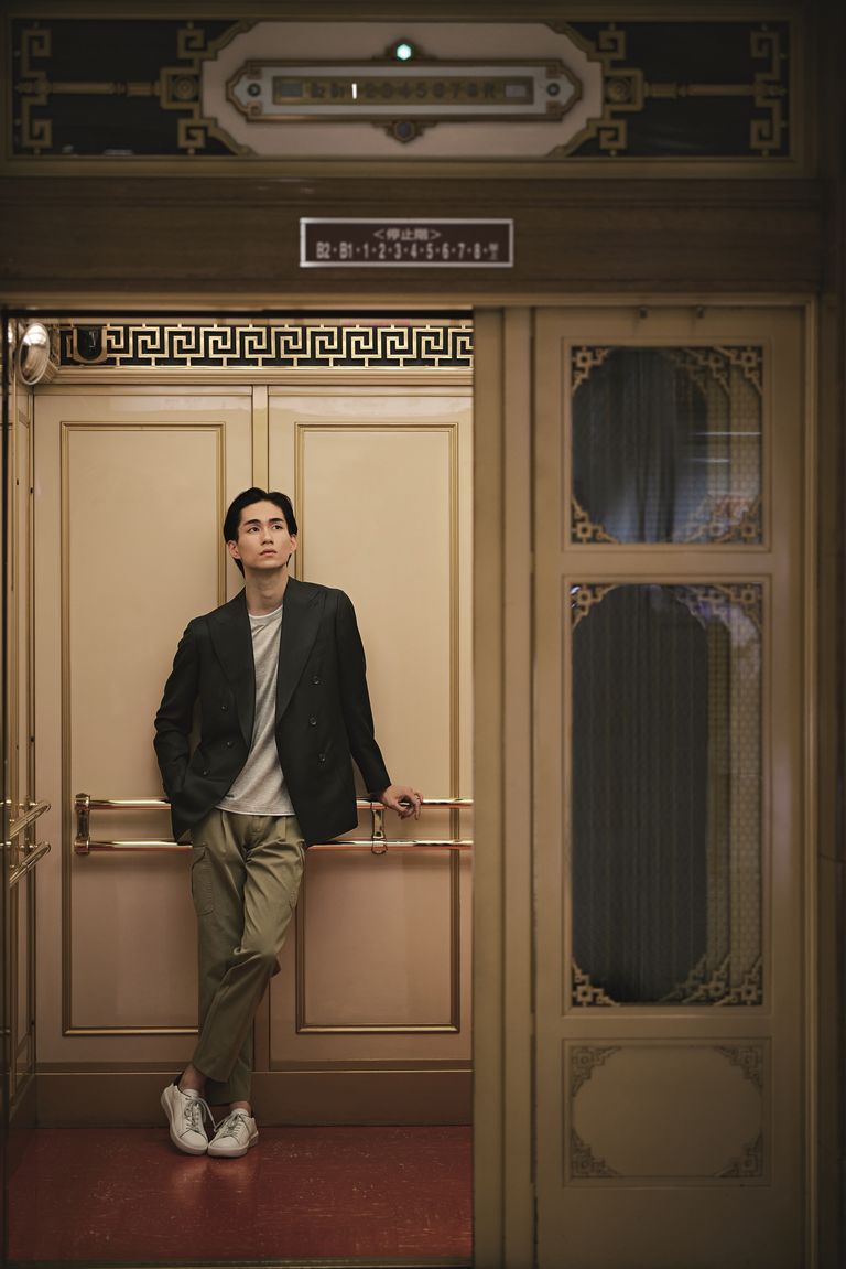 a man standing in front of a door