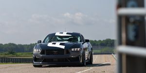 2024 ford mustang dark horse r race car debut photos on track with dark horse road car
