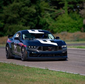 2024 ford mustang dark horse r race car debut photos on track with dark horse road car