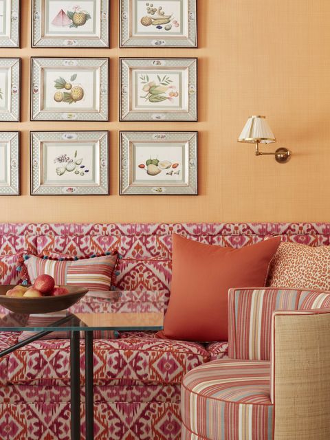 in the breakfast room low hanging fruit arrives in a series of 19th century chinese watercolors hung above a banquette in pink and orange fabric