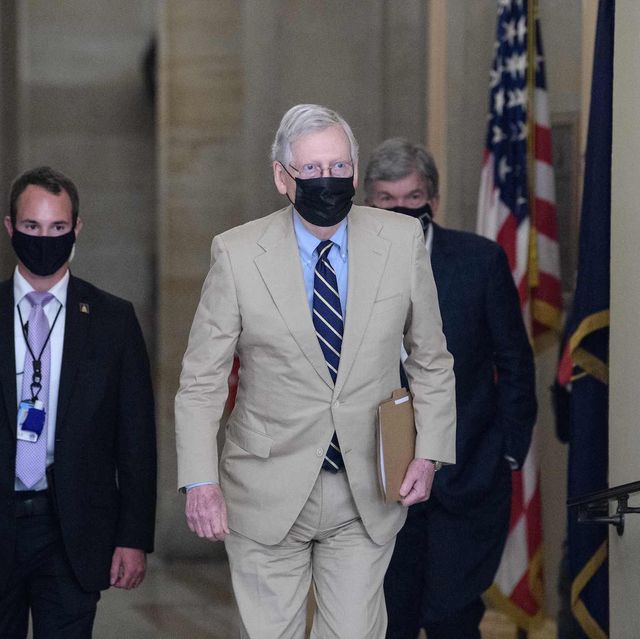 us senate majority leader mitch mcconnell walks to the senate chamber at the us capitol in washington, dc, on august 10, 2020   it took the united states just 17 days to move from four million to five million coronavirus cases    even as the country is finally starting to bend its curve downward photo by nicholas kamm  afp photo by nicholas kammafp via getty images