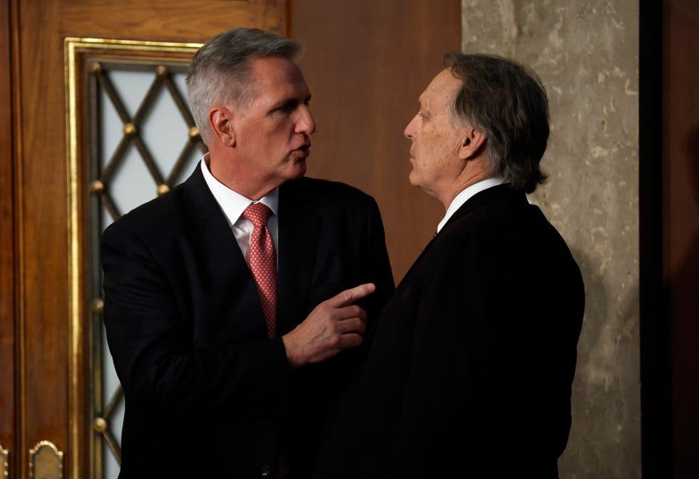 washington, dc january 05 us house republican leader kevin mccarthy r ca l talks to rep elect andy biggs r az in the house chamber during the third day of elections for speaker of the house at the us capitol building on january 05, 2023 in washington, dc the house of representatives is meeting to vote for the next speaker after house republican leader kevin mccarthy r ca failed to earn more than 218 votes on several ballots the first time in 100 years that the speaker was not elected on the first ballot photo by anna moneymakergetty images