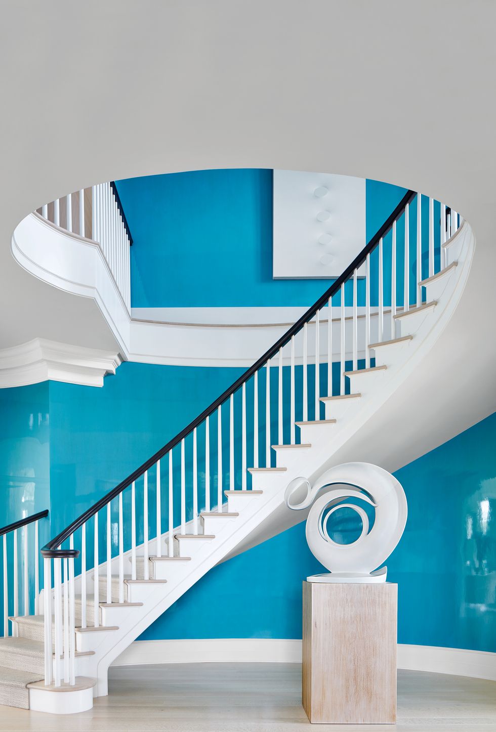 Spiral staircase with blue walls