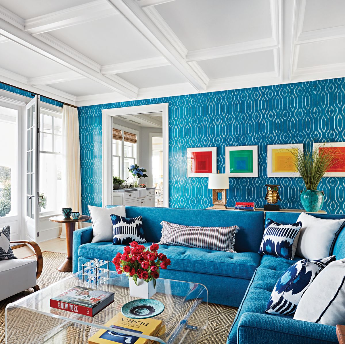 Blue family room with white curtains