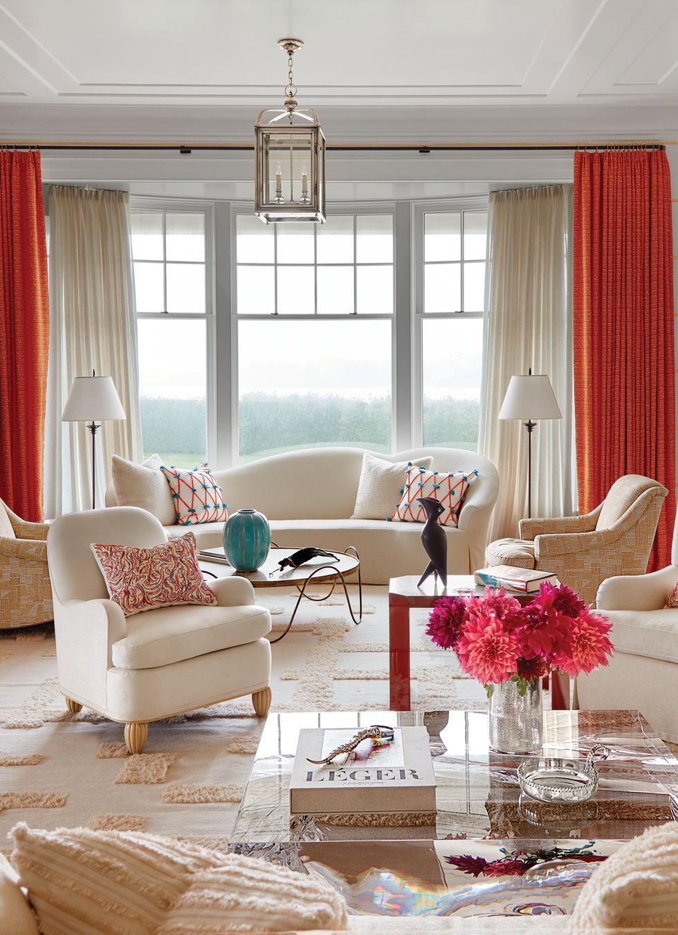 Living room with orange curtains