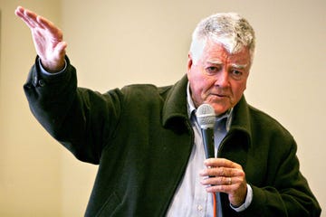 a man holding a microphone