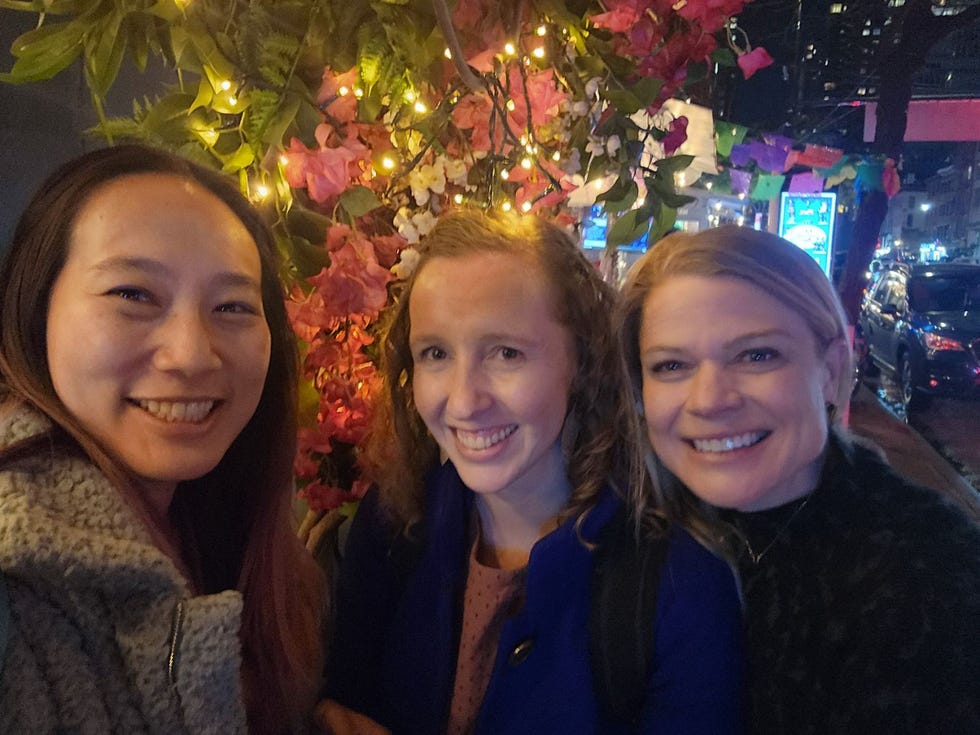 a group of women smiling