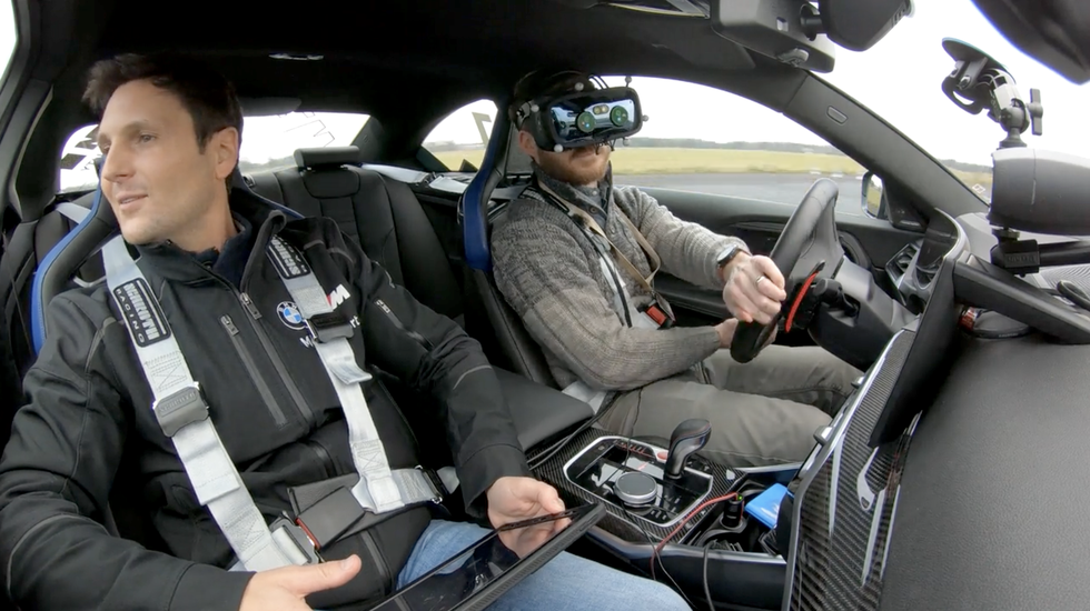eric stafford driving a bmw m2 on a virtual racetrack