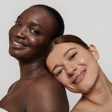 portrait of two individuals with obscured faces showcasing distinct skin tones and hairstyles