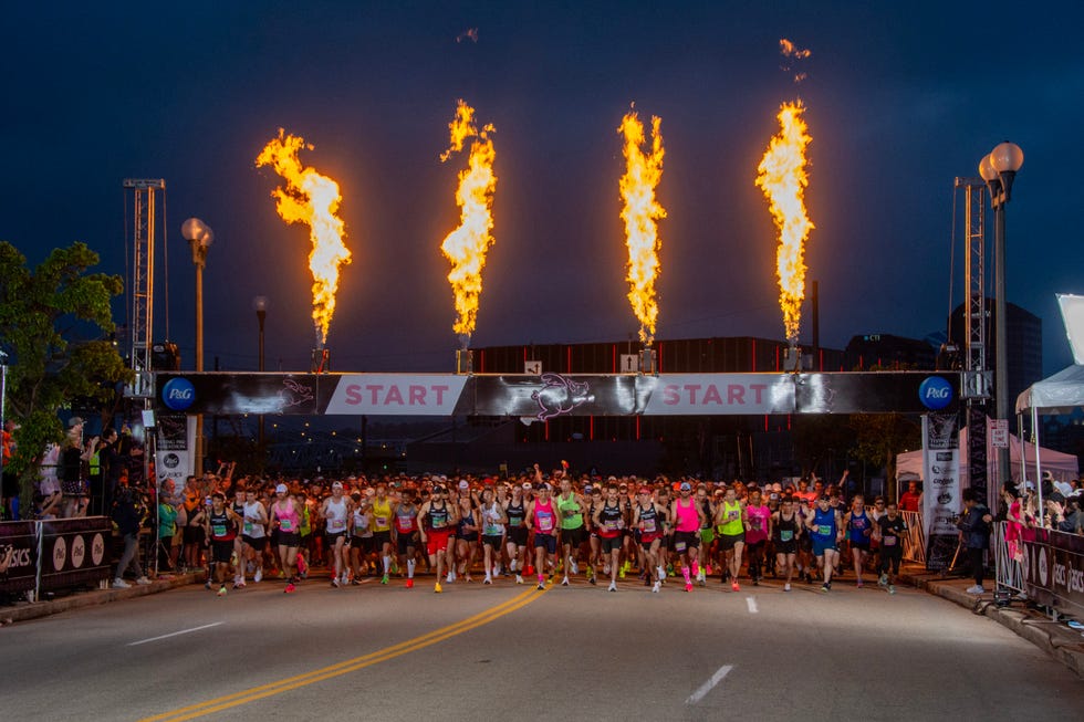 runners at start of flying pig marathon