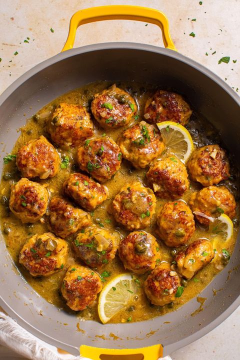 saucy chicken piccata meatballs with lemon slices