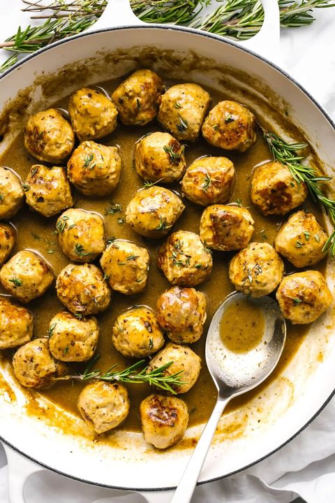 turkey meatballs with maple mustard sauce in pan with rosemary