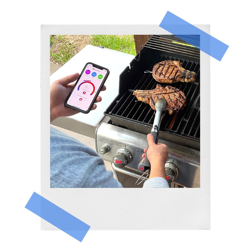 brandon using meater smart thermometer and app while grilling