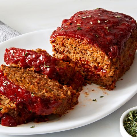 meatloaf sliced and topped with rosemary